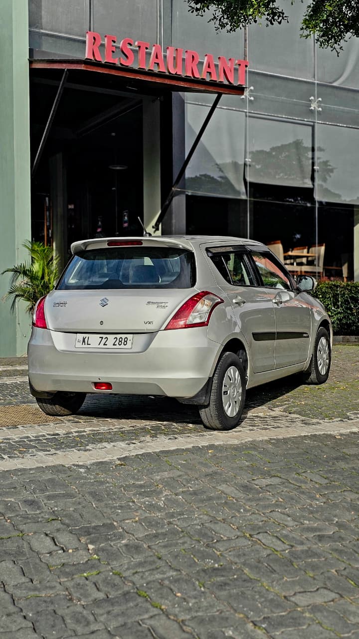 
								Maruthi Swift VXI 2013 models full									